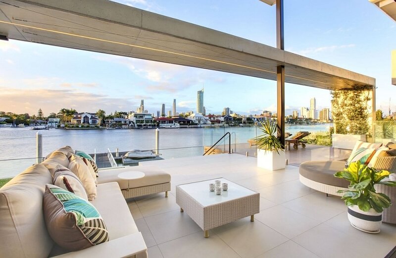 It’s a house that makes a statement. Dominated by unbroken, horizontal forms, and offering water frontage and city views, there’s a considerable 821 square metres of living space to kick back, relax and entertain in. Now on the market for $7.495 million, the five-bedroom home at 15 Cleland Crescent, Broadbeach Waters is kitted out with floor-to-ceiling windows, a 2000-bottle cellar, butler’s pantry, media room and spa. The vendor bought the block in 2010 for just under $2.895 million, with the market at the time feeling the effects of the GFC.