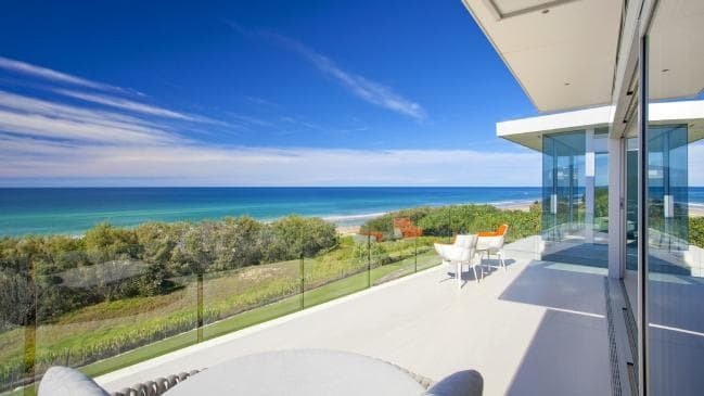Luxury beachfront home with epic waterslide could be yours
