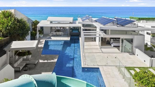 Luxury beachfront home with epic waterslide could be yours